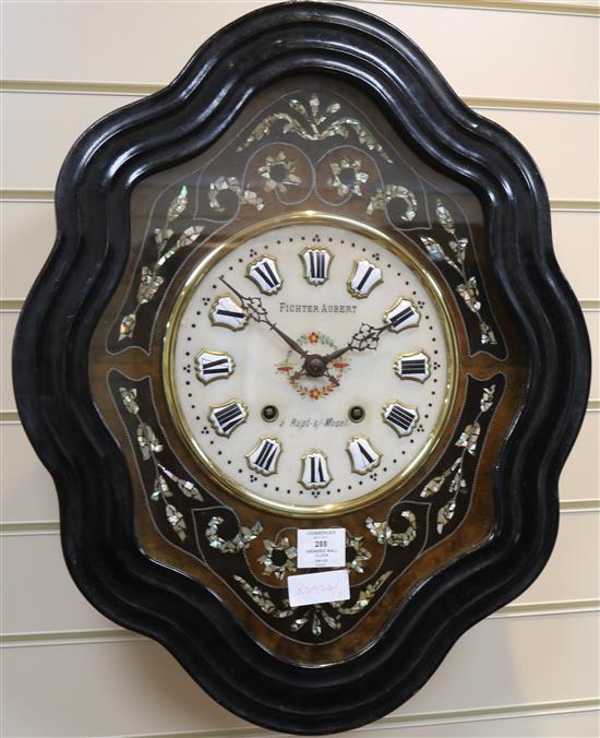 A Fichter and Aubert ebonised wall clock